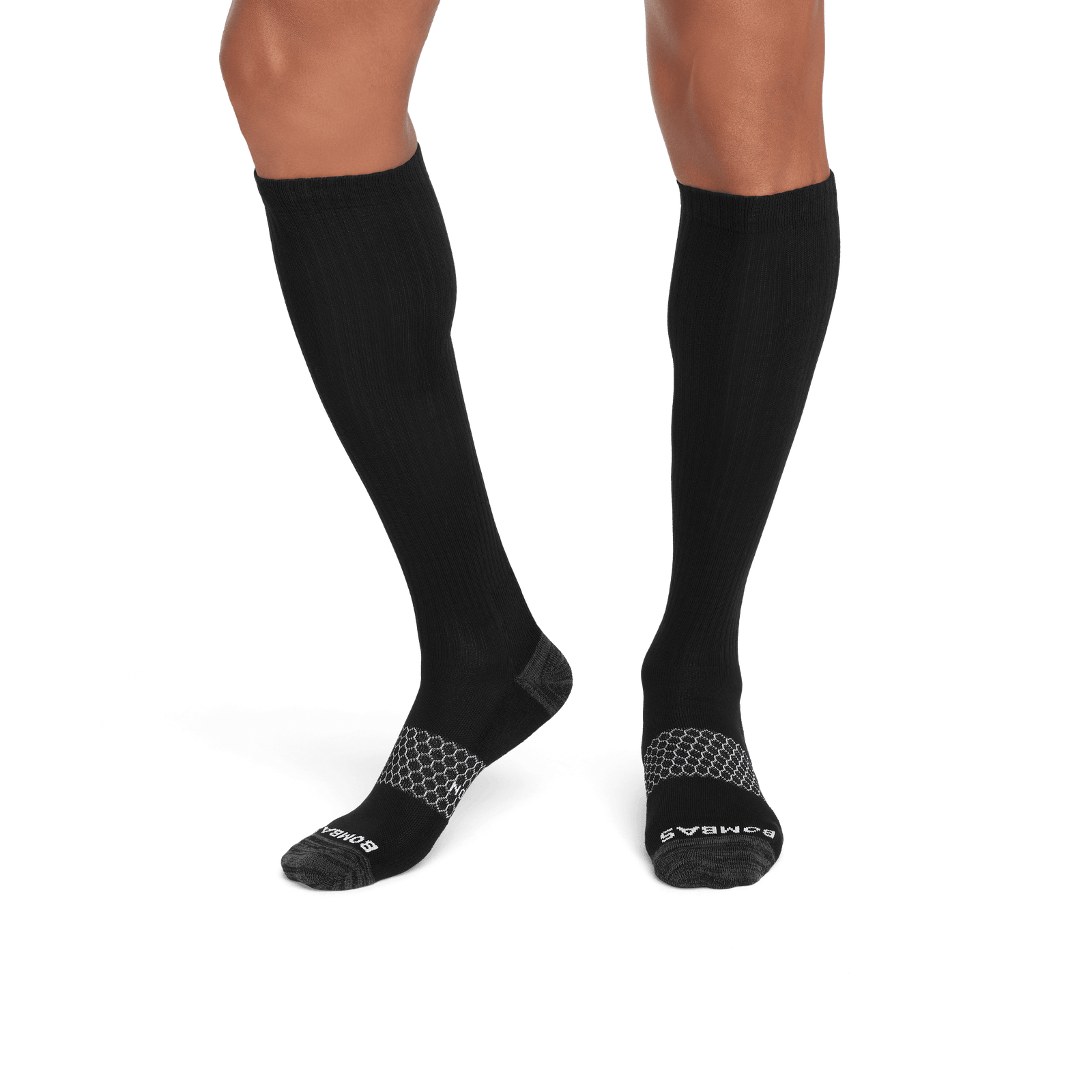 official-bombas::7759-black-adult-male-2-transparent.png